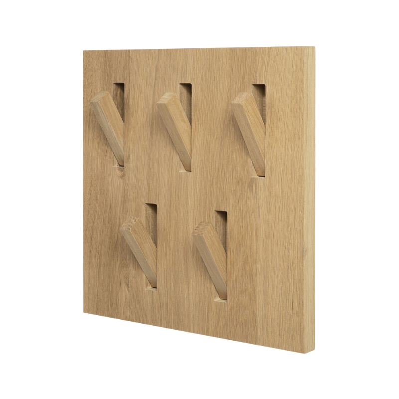 The Oak Utilitile perfectly combines form and function. This minimalistic solid oak coat hanger is a great option to elevate your hallway and optimize wall space to hang your coats and accessories.