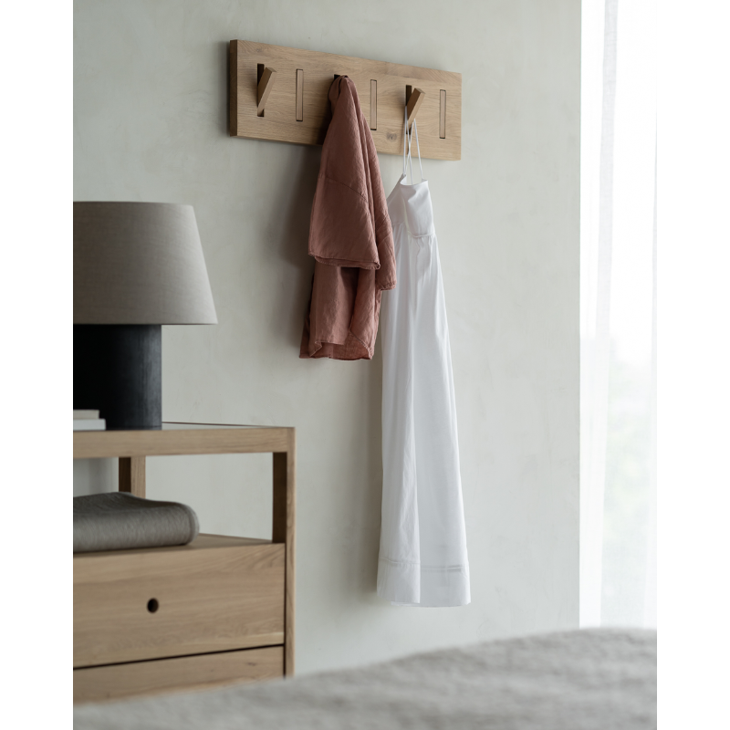The Oak Utilitile perfectly combines form and function. This minimalistic solid oak coat hanger is a great option to elevate your hallway and optimize wall space to hang your coats and accessories.