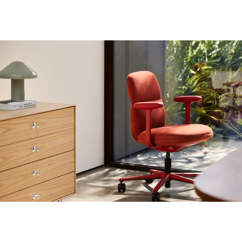 The Asari Chair from Herman Miller in a bedroom.