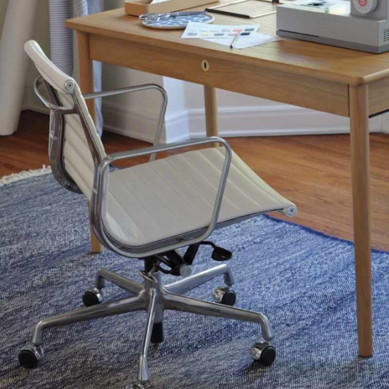 The Eames Aluminum Group Chair, Executive from Herman Miller in a business.