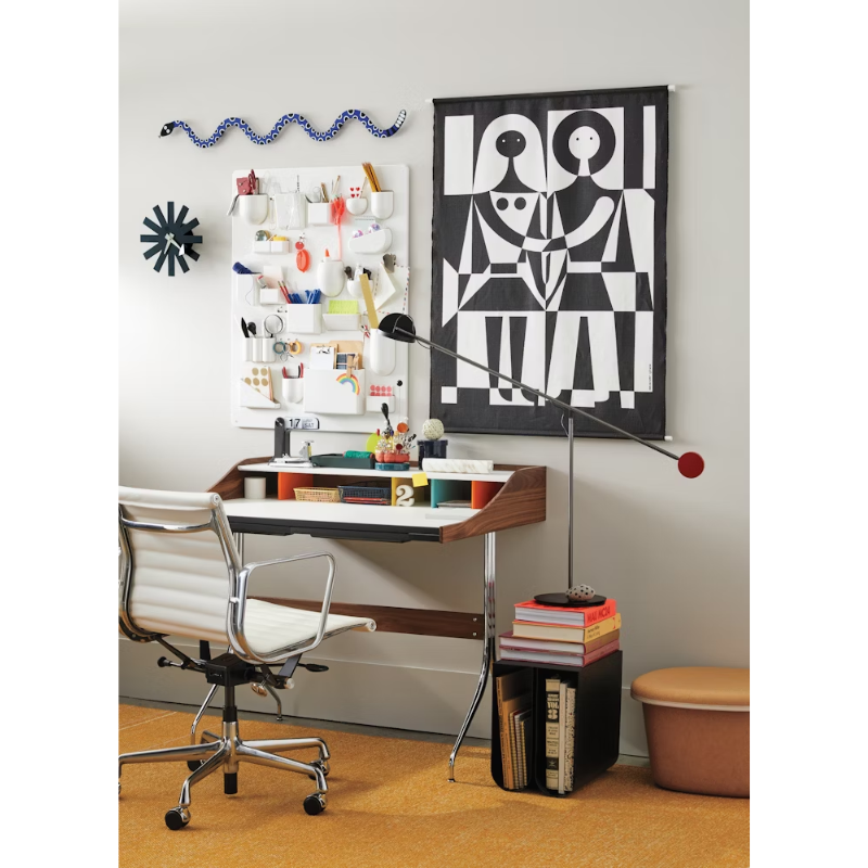 The Eames Aluminum Group Chair, Executive from Herman Miller focusing on the design.