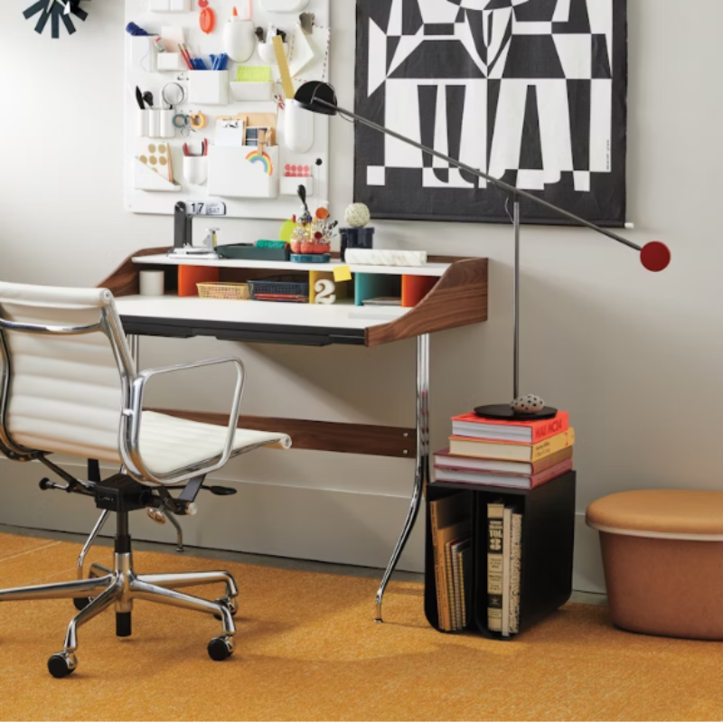 The Eames Aluminum Group Chair, Executive from Herman Miller focusing on the design.