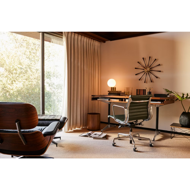 The Eames Aluminum Group Chair, Executive from Herman Miller in a family space.