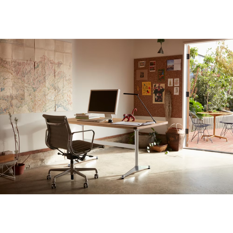 The Eames Aluminum Group Chair, Executive from Herman Miller in a home office.