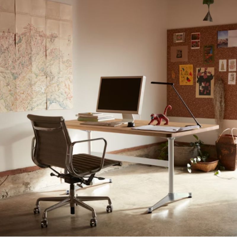 The Eames Aluminum Group Chair, Executive from Herman Miller in a home office.