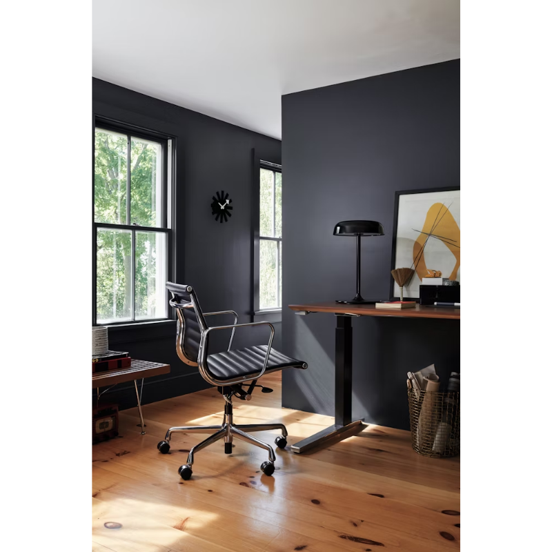 The Eames Aluminum Group Chair, Executive from Herman Miller in a residential setting.