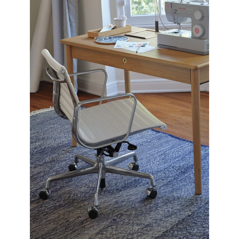 The Eames Aluminum Group Chair, Management from Herman Miller in a business.