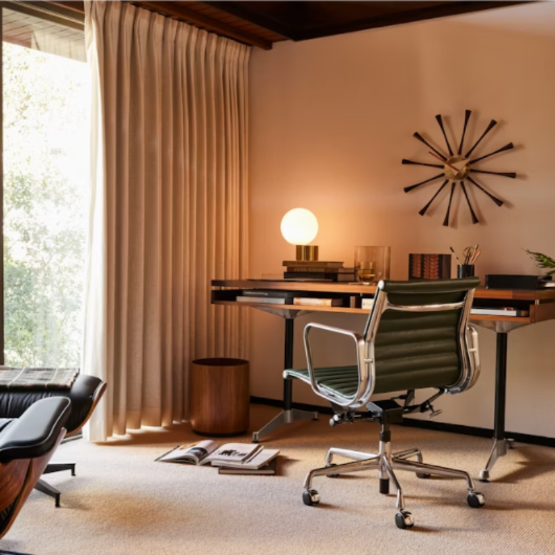 The Eames Aluminum Group Chair, Management from Herman Miller in a family space.