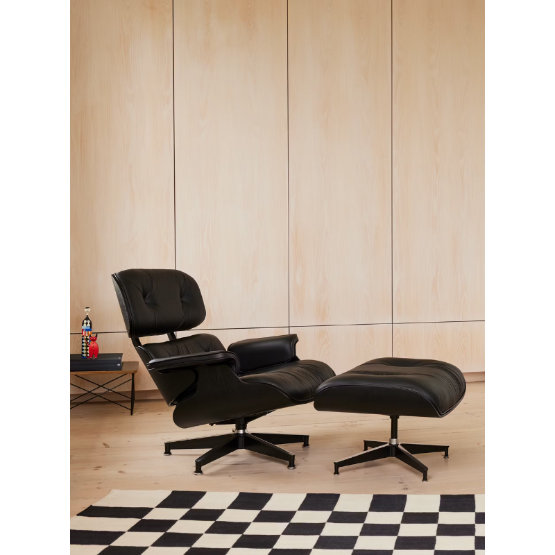The Eames Lounge Chair and Ottoman from Herman Miller in a family space. all-groups