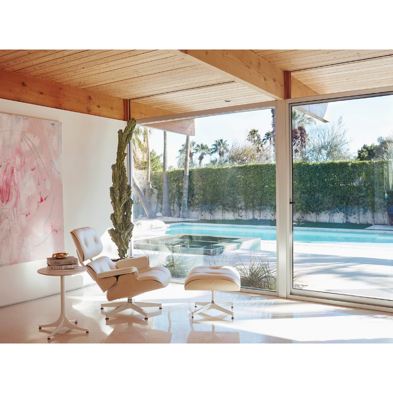 The Eames Lounge Chair and Ottoman from Herman Miller in a pool house. all-groups