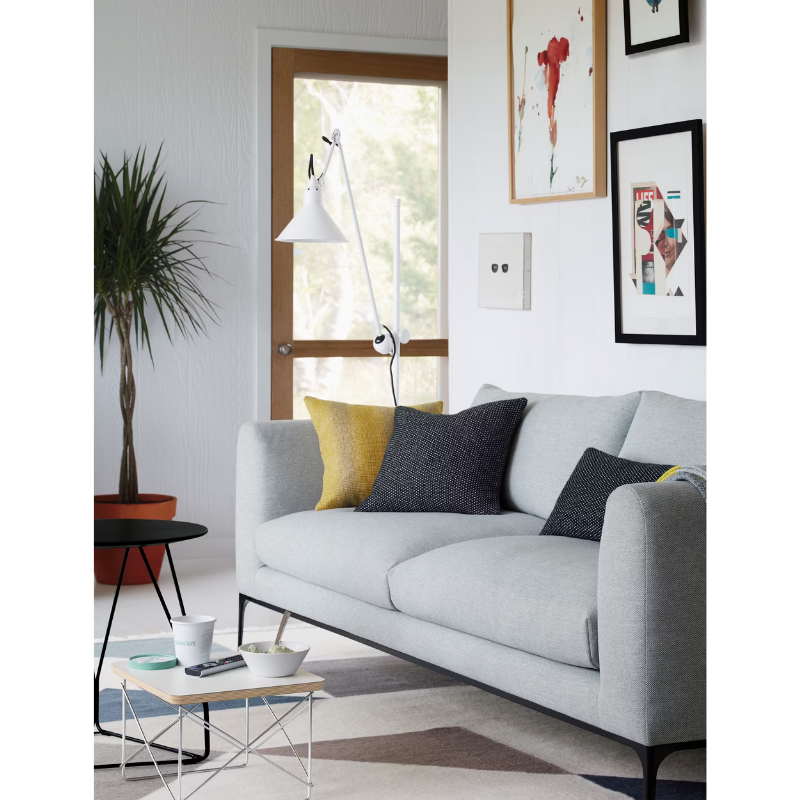 The Eames Wire Base Low Table from Herman Miller in a family space.