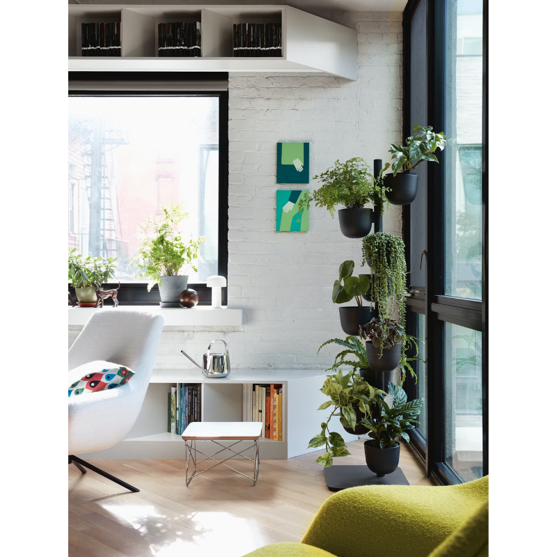 The Eames Wire Base Low Table from Herman Miller in a living room.