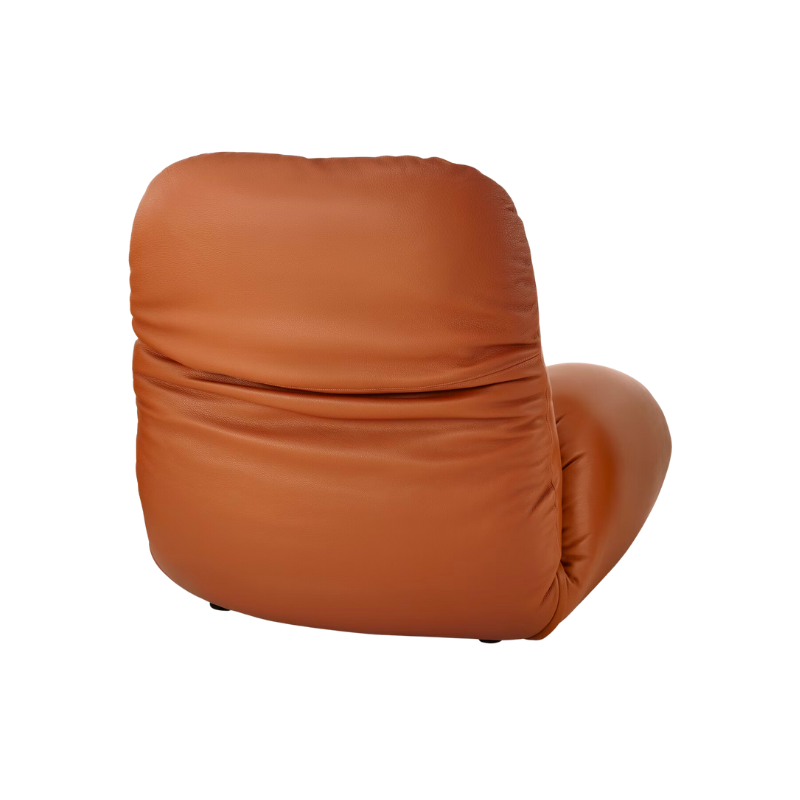 The Luva Modular Armchair presents timeless beauty in an inventive form. Fold up, down, or reconfigure as you please. Created by designer Gabriel Tan, Luva is a case study for probing at the intersections of art, design, and culture. The chair's elemental form is inspired by the soft-rolled tops of Japanese futons and the padded tactility of a boxing glove.