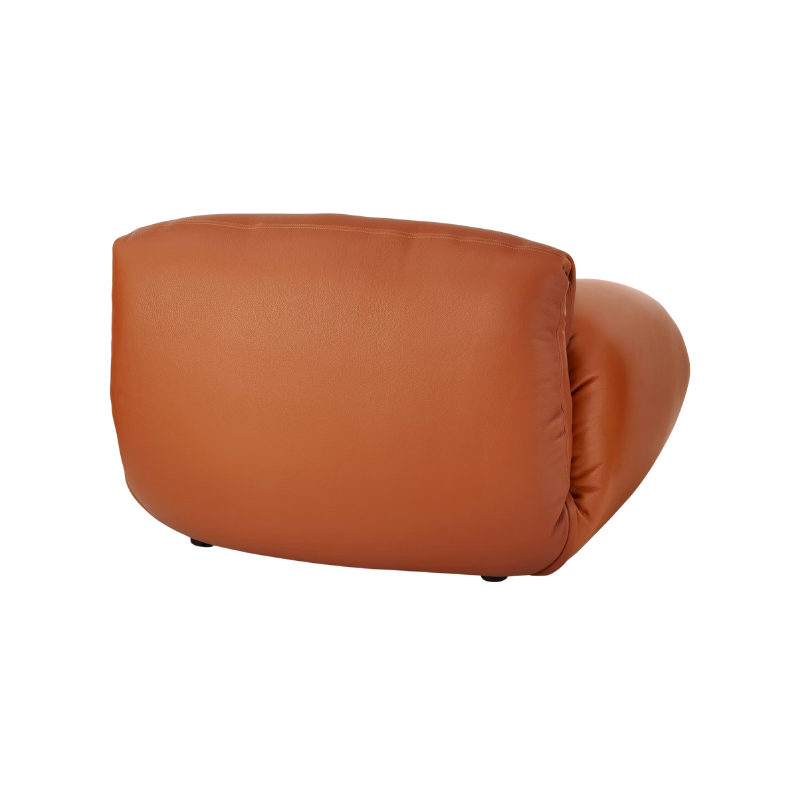 The Luva Modular Armchair presents timeless beauty in an inventive form. Fold up, down, or reconfigure as you please. Created by designer Gabriel Tan, Luva is a case study for probing at the intersections of art, design, and culture. The chair's elemental form is inspired by the soft-rolled tops of Japanese futons and the padded tactility of a boxing glove.