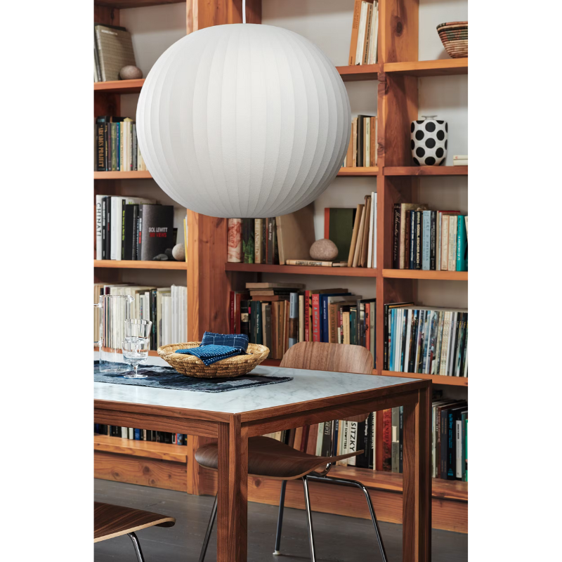 The Nelson Ball Bubble Pendant from Herman Miller in a dining room.