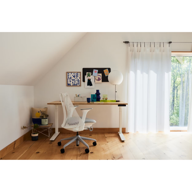 The Nelson Ball Lotus Table Lamp from Herman Miller in an office.