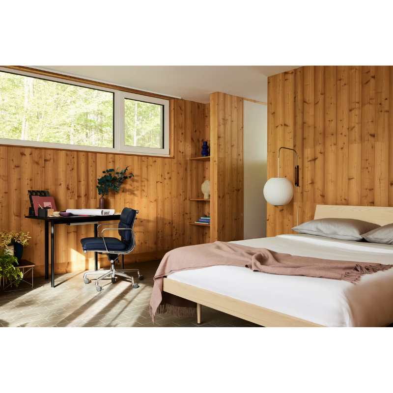 The Nelson Ball Wall Sconce from Herman Miller in a home office.