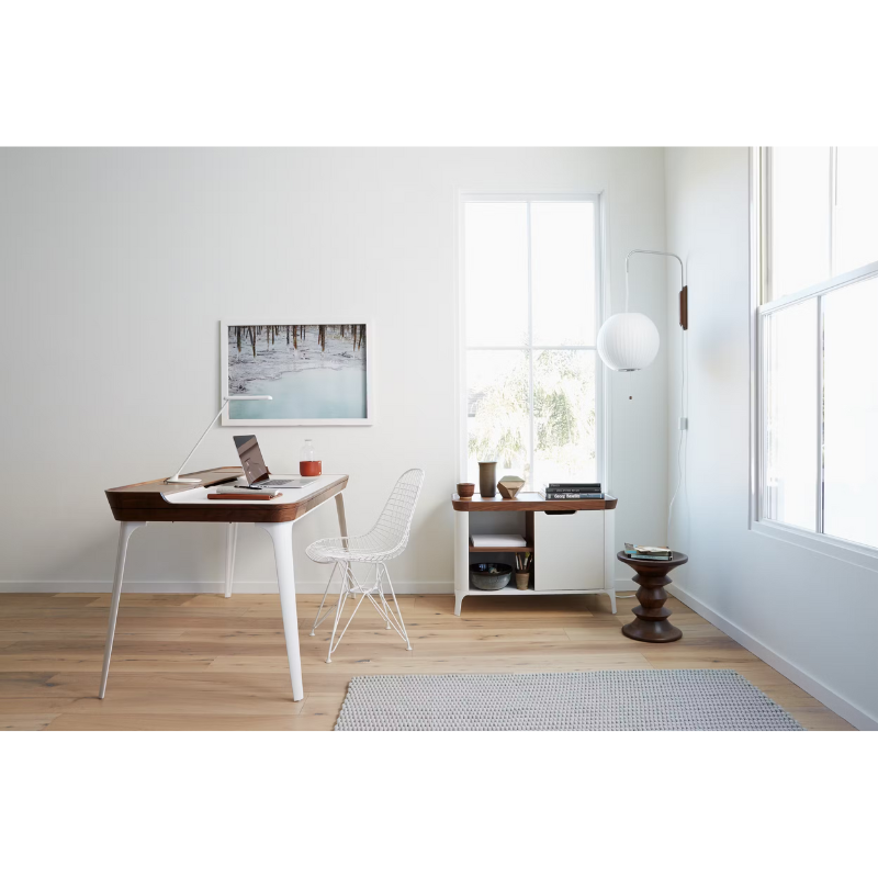 The Nelson Ball Wall Sconce from Herman Miller within a study.