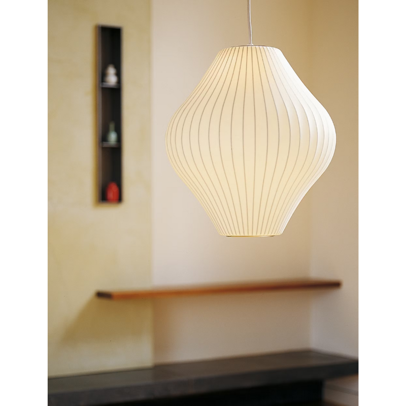 The Nelson Pear Bubble Pendant from Herman Miller in an entryway.