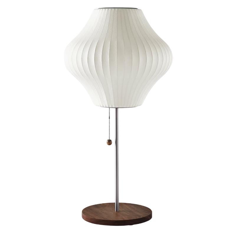 The Nelson Pear Lotus Table Lamp from Herman Miller in walnut.