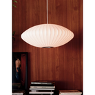 The Nelson Saucer Bubble Pendant from Herman Miller in a close up lifestyle photograph.