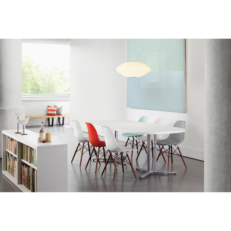 The Nelson Saucer Bubble Pendant from Herman Miller within a dining room.