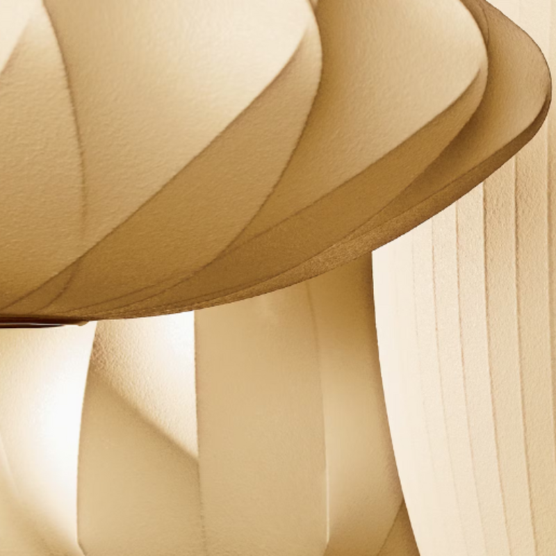 The Nelson Saucer Crisscross Bubble Pendant from Herman Miller in a close up lifestyle shot. all-groups