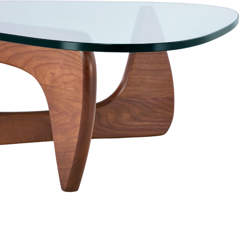 The Noguchi Table from Herman Miller in walnut in a detailed shot.