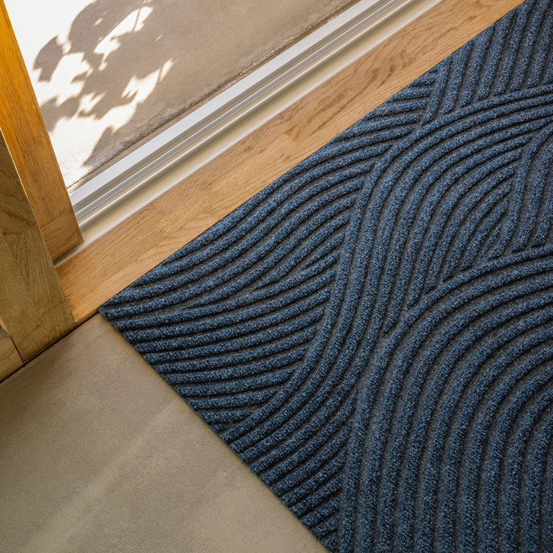 The Sjø Doormat from Heymat in a home.