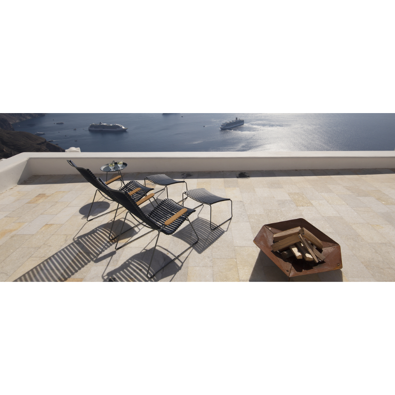 The CLICK outdoor lounge chair is an extension of the CLICK Rocking chair, offering the same level of comfort. It features lamellas with the right resilience for cushion-free comfort. These lamellas can be easily clicked on and off, allowing you to modify the chair's look by changing or mixing different colors. The CLICK Lounge chair is available in 13 colors, providing plenty of options for customization.