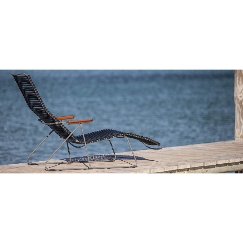 CLICK Sunlounger. The adjustable backrest, is shaped to fit your body perfect in its different positions. The curves make the Sunlounger very sculptural. Sit down, find your position and enjoy.