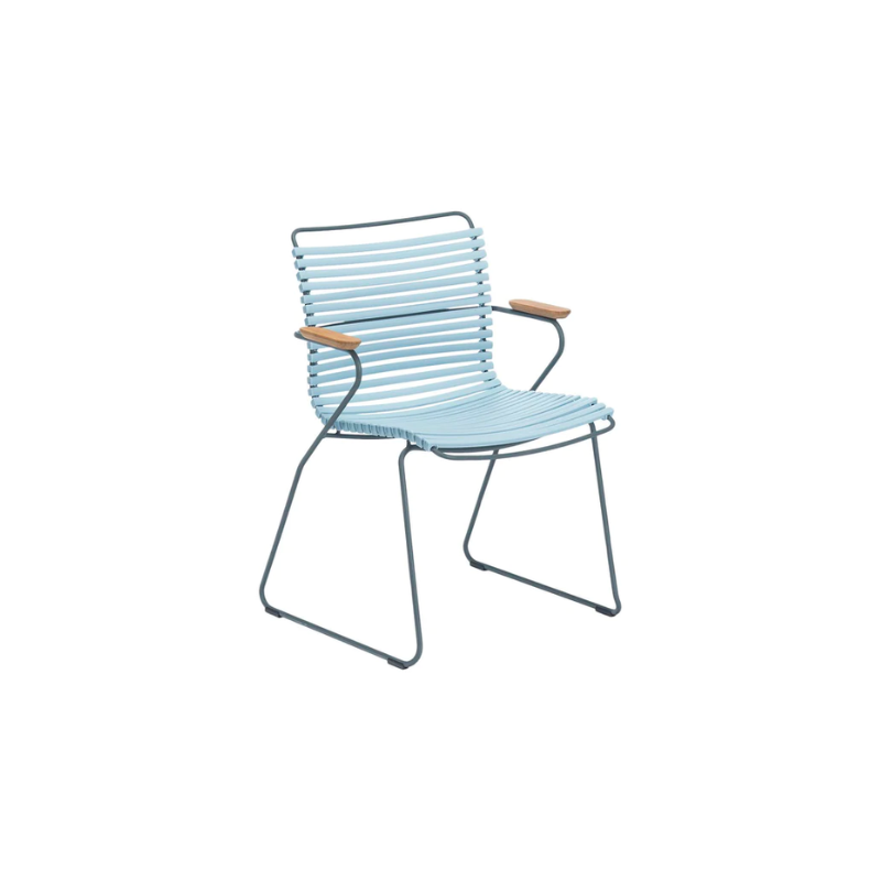 CLICK outdoor dining armchair is simple, honest, and ergonomically well thought out. It is beautiful in its repetition around the table and because the slats (lamellas) can be replaced, you can mix and change the colors as often as you like. These outdoor dining chairs are stackable and easy to store.