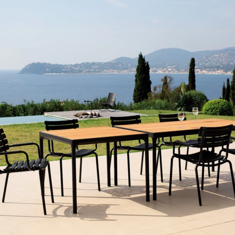 A dining table with a top and four legs – that is what you get in FOUR, no matter which size you choose. The special developed extruded profile in the table frame makes FOUR a remarkable strong table. FOUR in 4 different sizes with table top options in bamboo or black metal, with legs in powder coated black or grey aluminum.