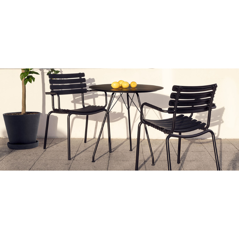 The ReCLIPS Dining Chairs come in four colors with the option of adding bamboo armrests. The combination of the aluminum frame with UV-protected plastic lamellas ensures minimal maintenance, making these chairs an ideal choice for hassle-free use. Like all good designs, these dining chairs are not just beautiful but practical as well. They are stackable, facilitating easy storage and space optimization.