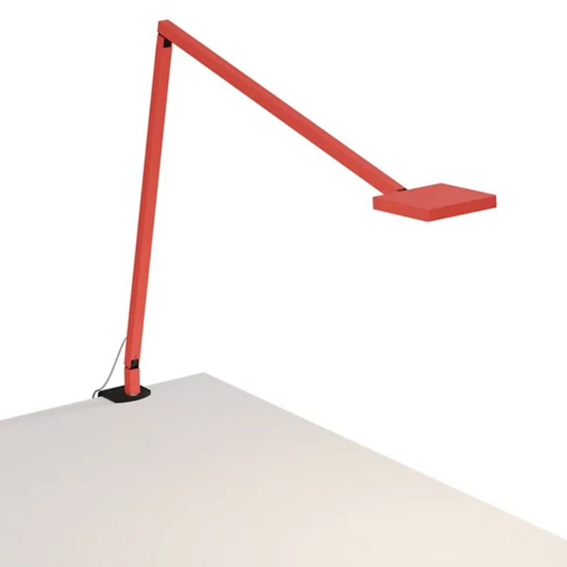 The Focaccia Desk Lamp from Koncept with the desk clamp in matte fire red.