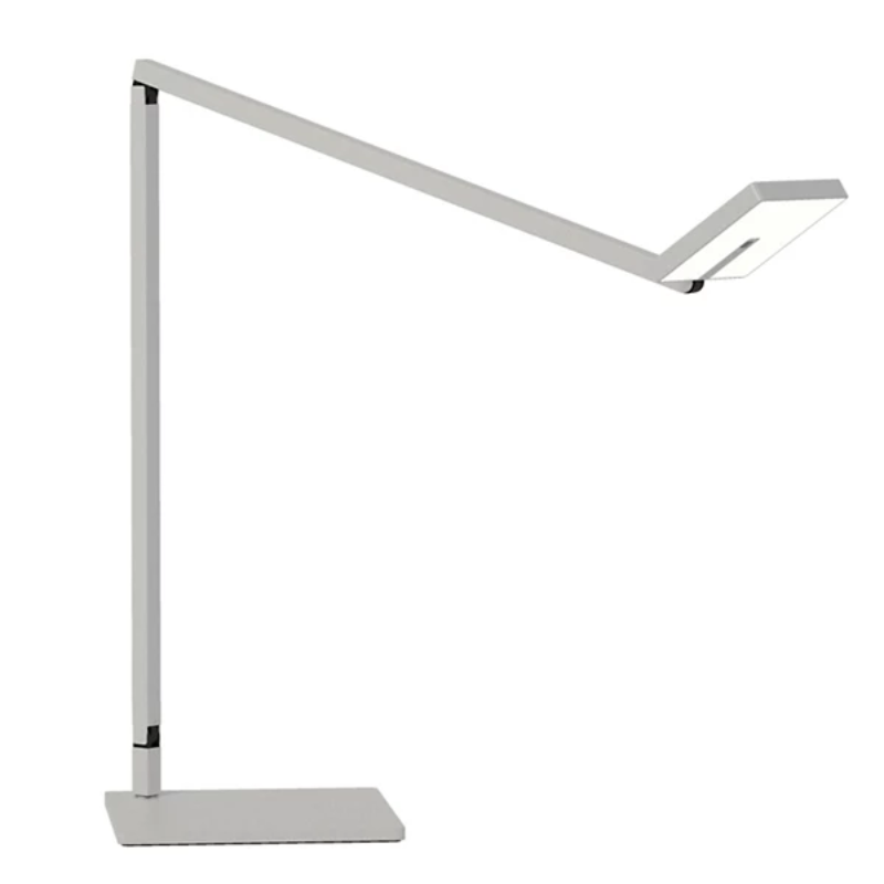 The Focaccia Desk Lamp from Koncept with the square table base in silver.