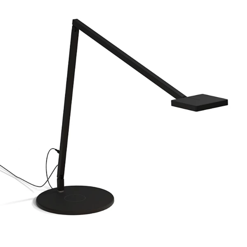 The Focaccia Desk Lamp from Koncept with the wireless charging base in matte black.