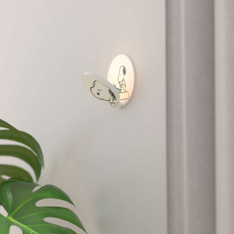 The Peanuts Edition Gravy Wall Sconce from Koncept in the Snoopy style in a family space.