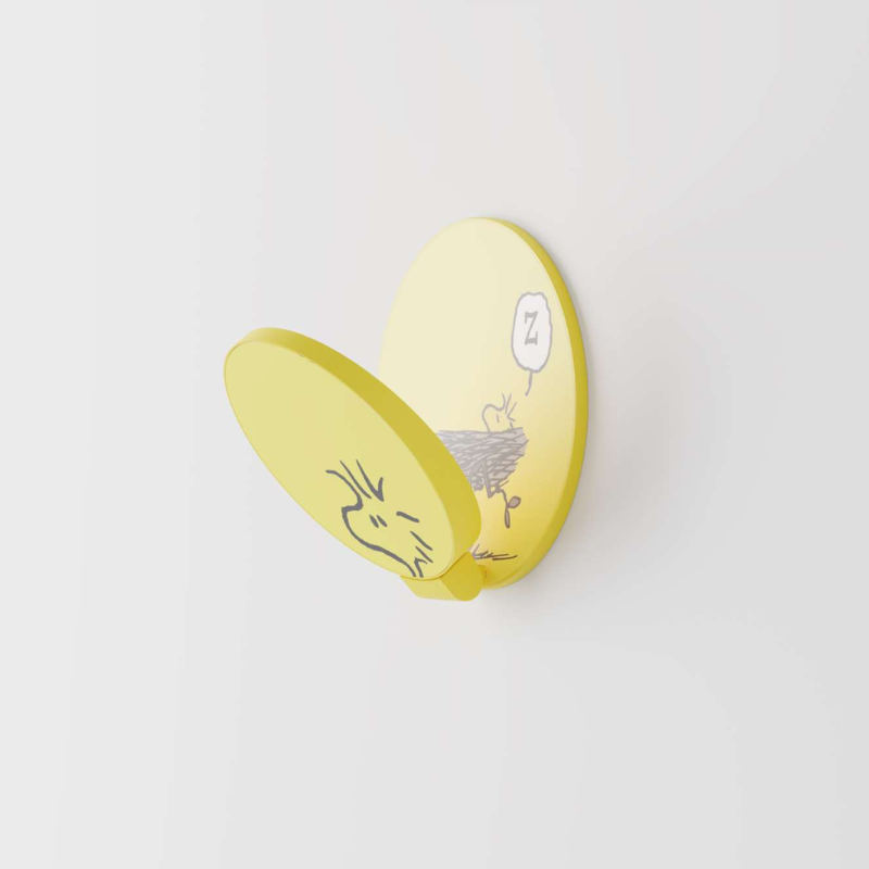 The Peanuts Edition Gravy Wall Sconce from Koncept in the Woodstock style from the side.