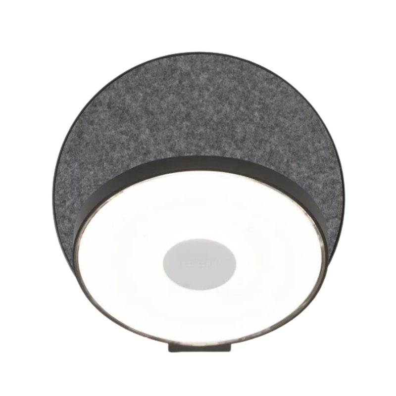 The Plug-In Gravy Wall Sconce from Koncept with the metallic black body and oxford (felt) plate.