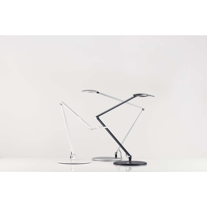 Lifestyle Picture of the Koncept Mosso Pro Table Lamp, showcasing all three colors.