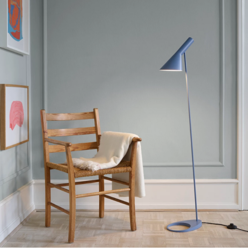 The AJ Floor from Louis Poulsen in a lighting lifestyle photograph highlighting the floor lamp.