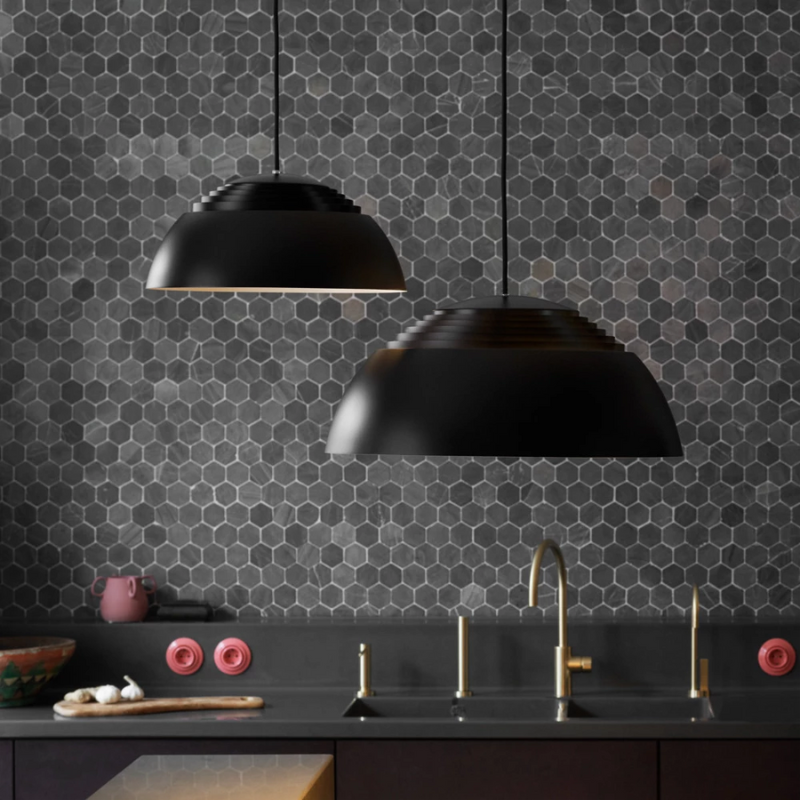 The AJ Royal from Louis Poulsen in a kitchen.