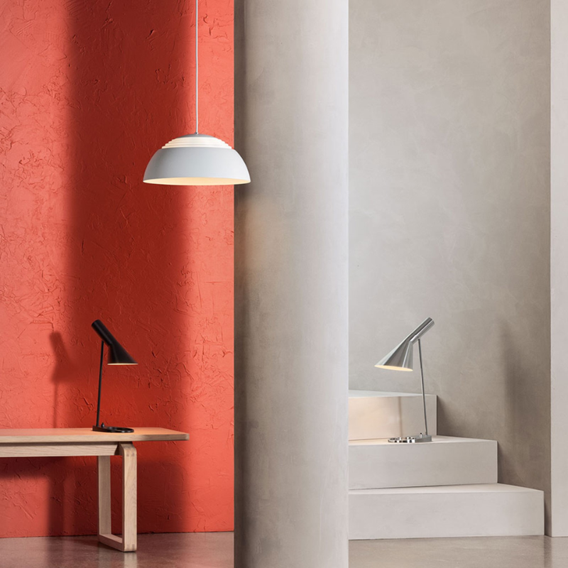 The AJ Royal from Louis Poulsen in a living room.