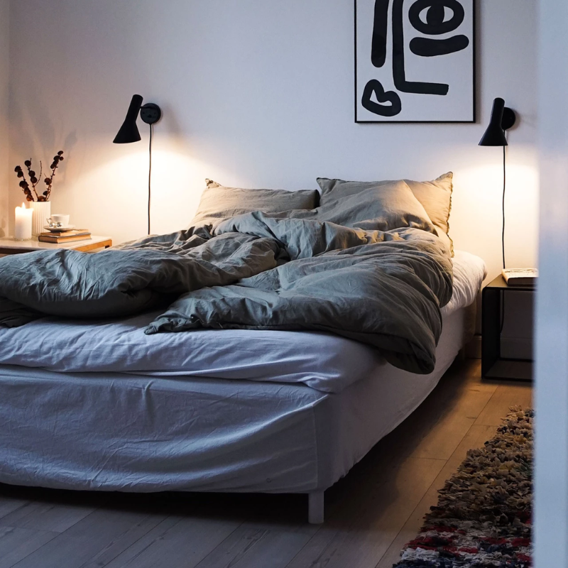 The AJ Wall from Louis Poulsen in a bedroom.