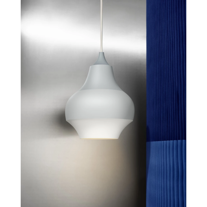 The Cirque from Louis Poulsen within a bedroom.