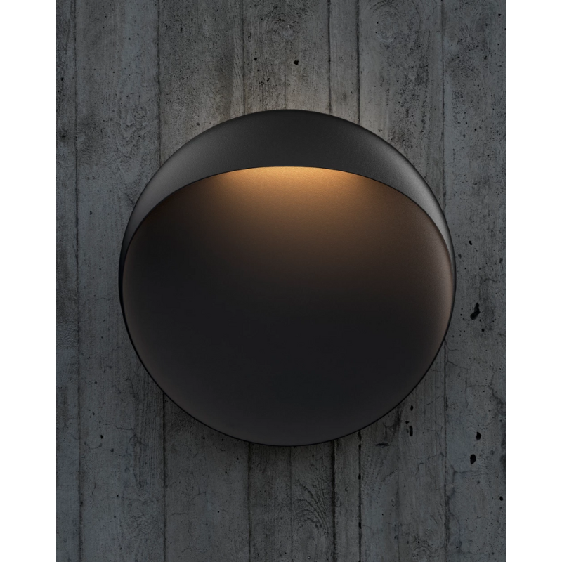 The Flindt Wall from Louis Poulsen in an outdoor living space.