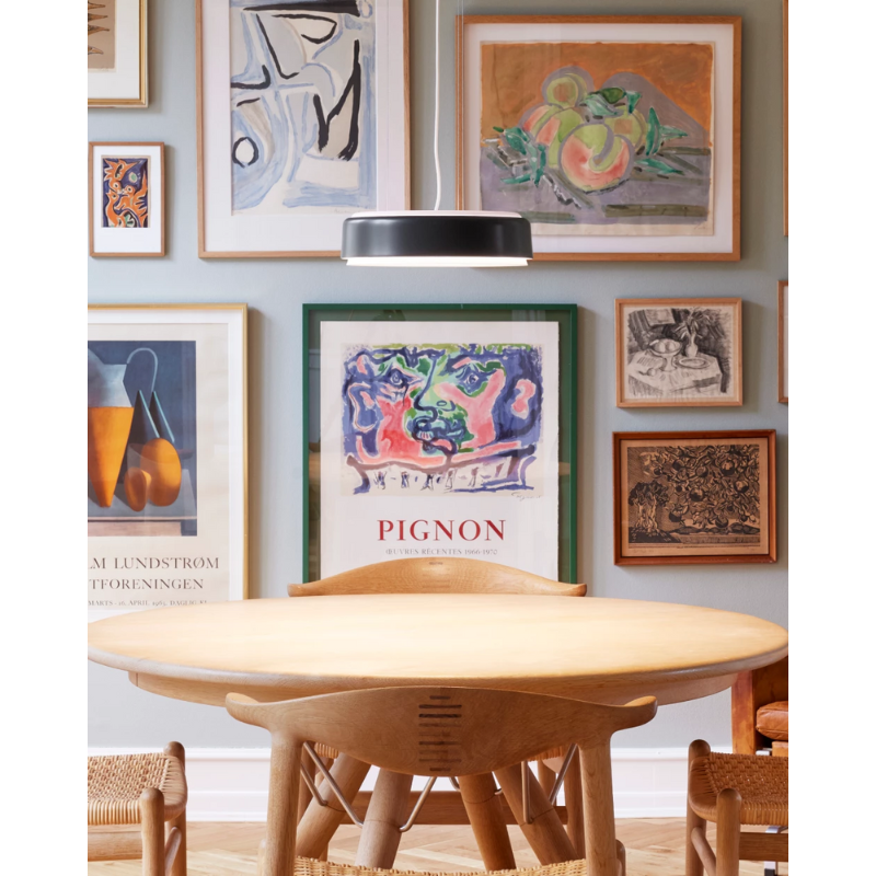 The LP Grand Suspended from Louis Poulsen in a living room.