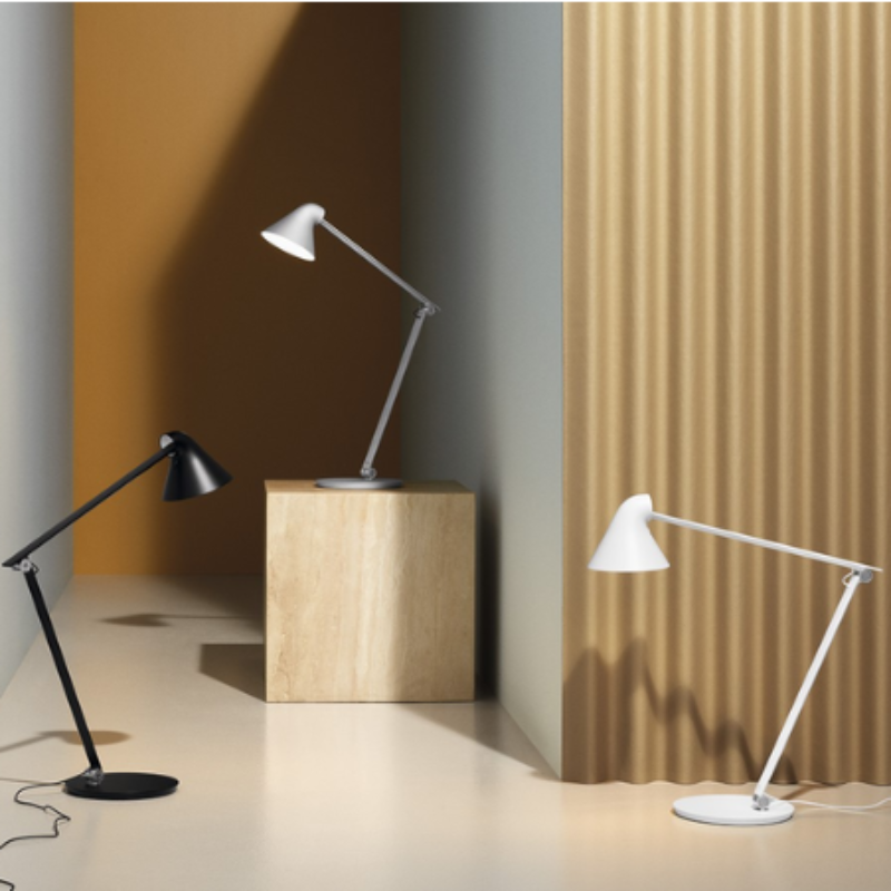 The NJP Table from Louis Poulsen in a family space. all-groups