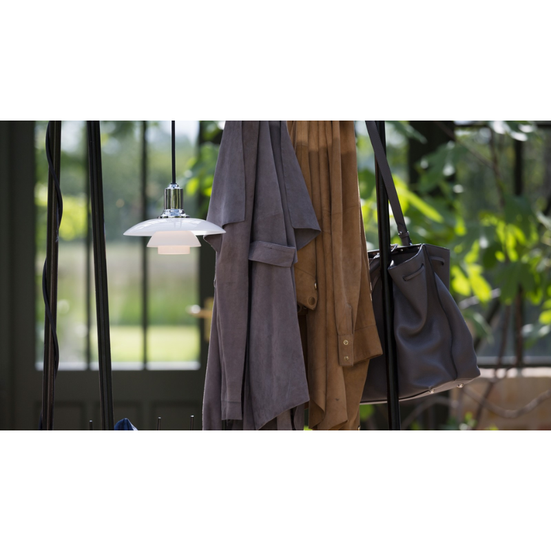 The PH 2/1 Pendant from Louis Poulsen in a family space lifestyle photograph.